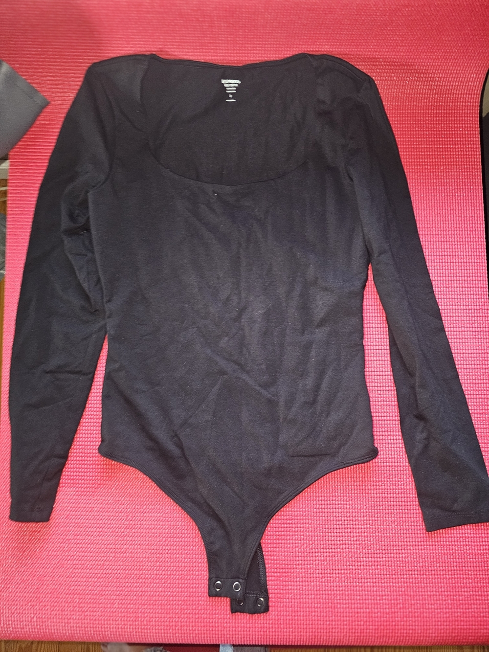 Classic EXPRESS Body Contour black bodysuit in women’s size Small